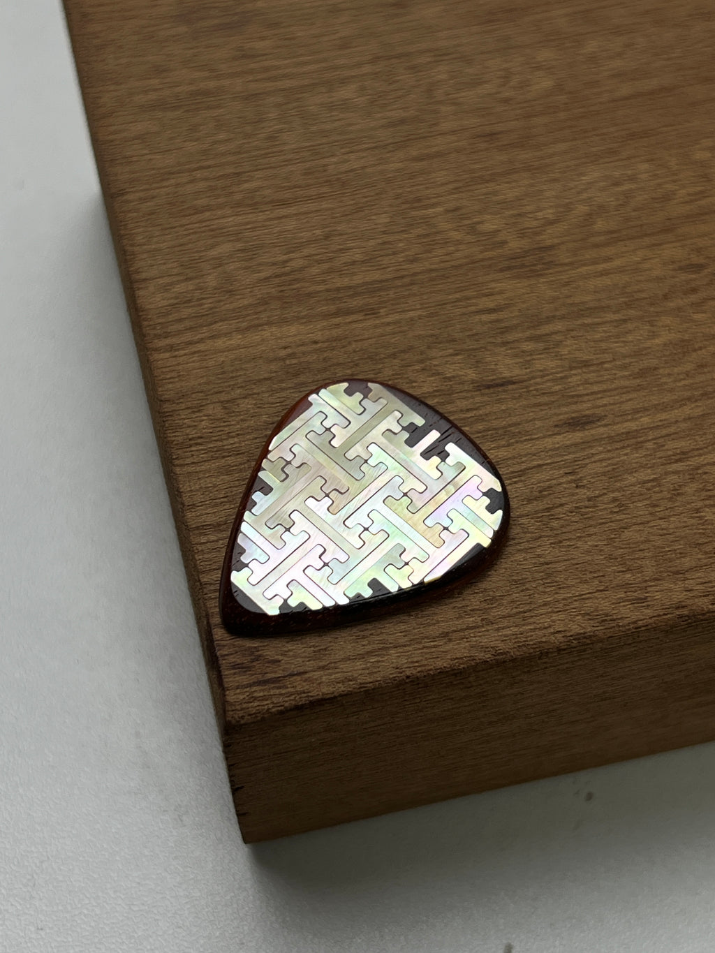 Handmade Wooden Guitar Pick with Mother of Pearl Geometric Swastika Pattern Inlay